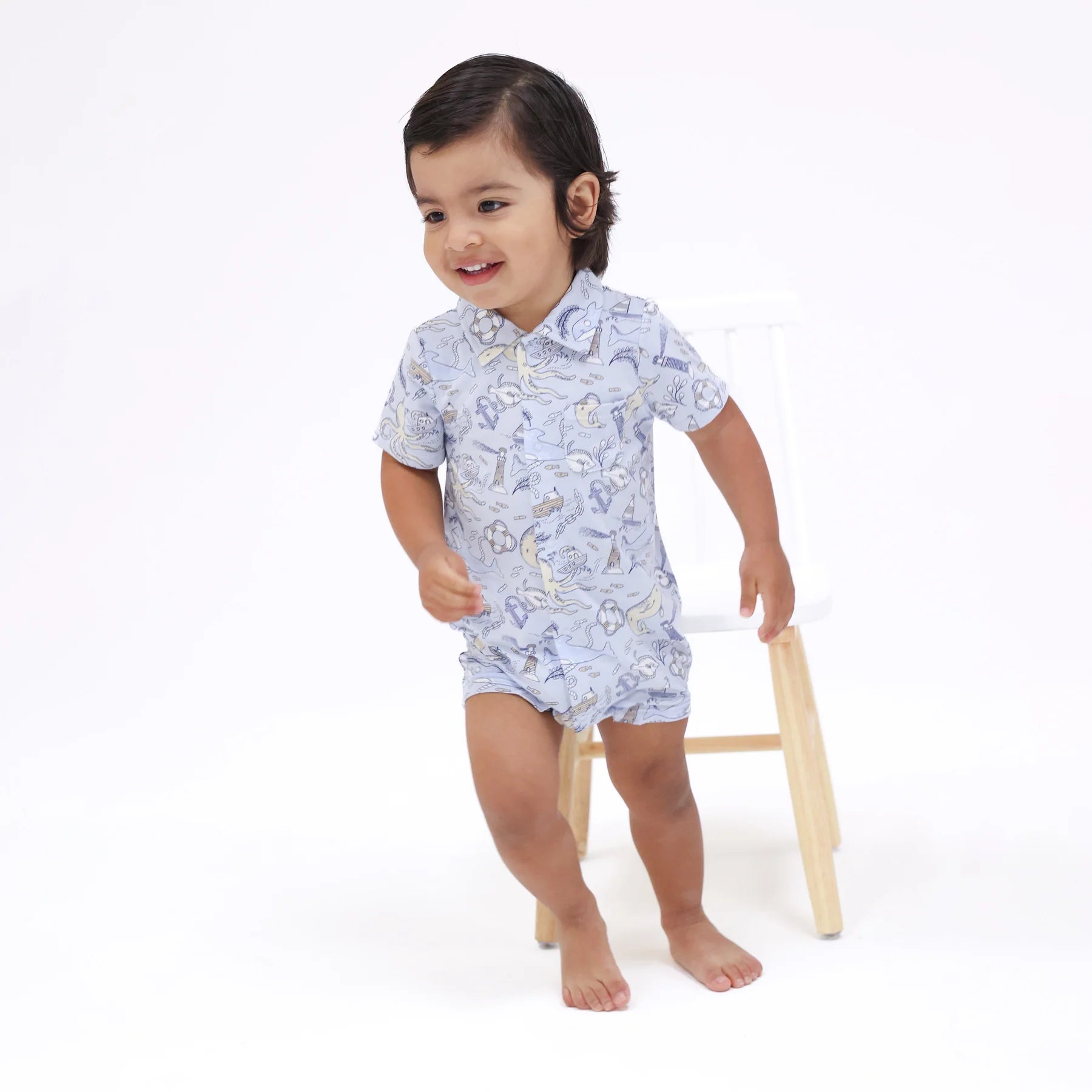 blue nautical notebook romper