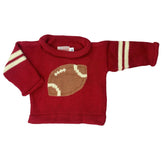 red sweater with 2 ivory stripes on each sleeve and brown football in the center