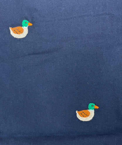 close up of embroidered ducks