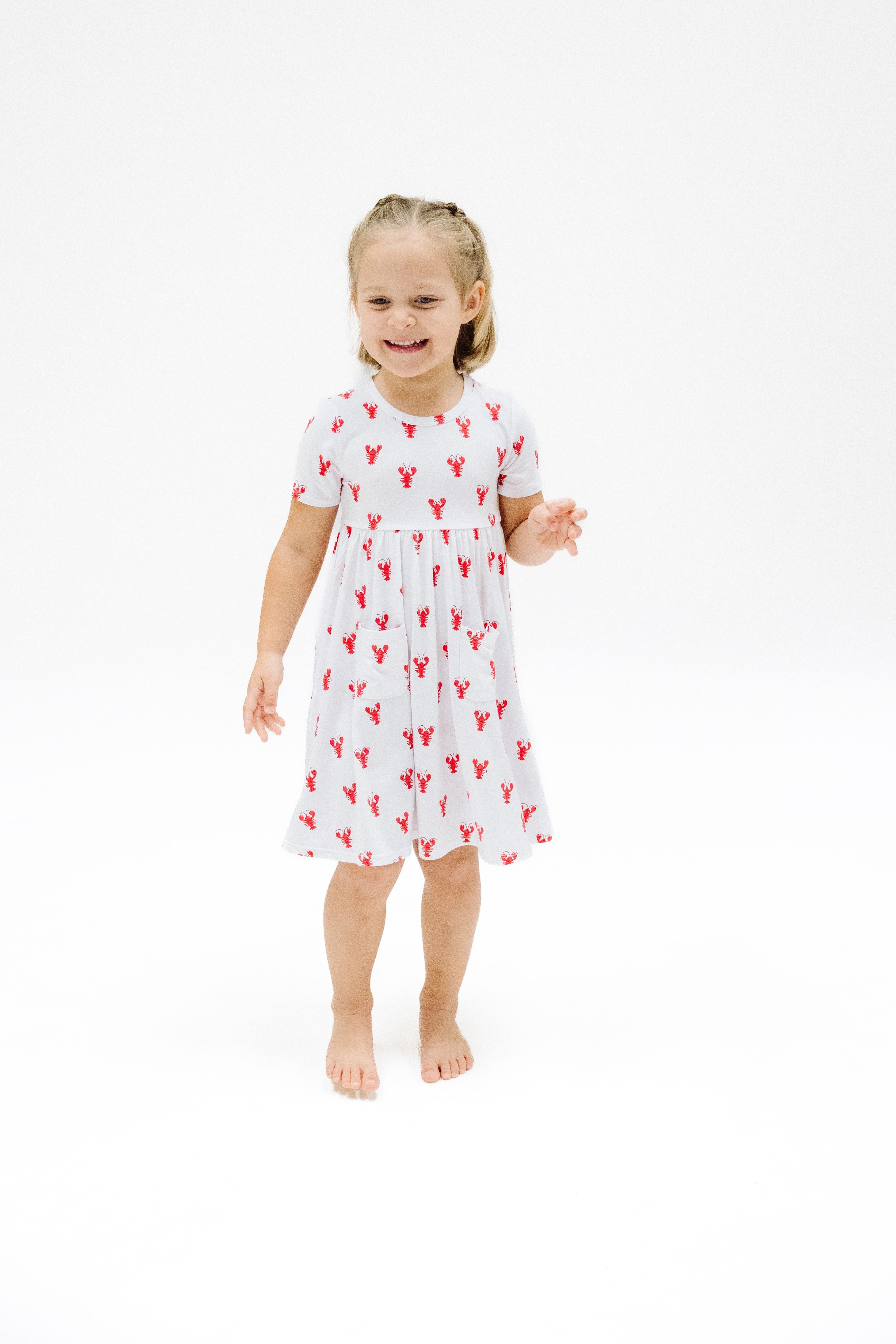 white short sleeve dress with red lobsters all over