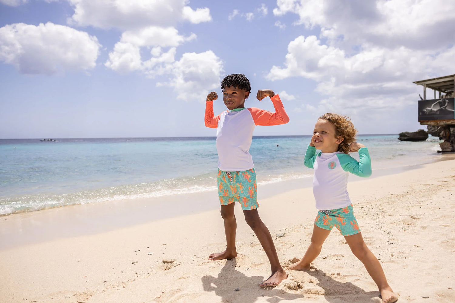 lobster boys swim shorts and rashguard top