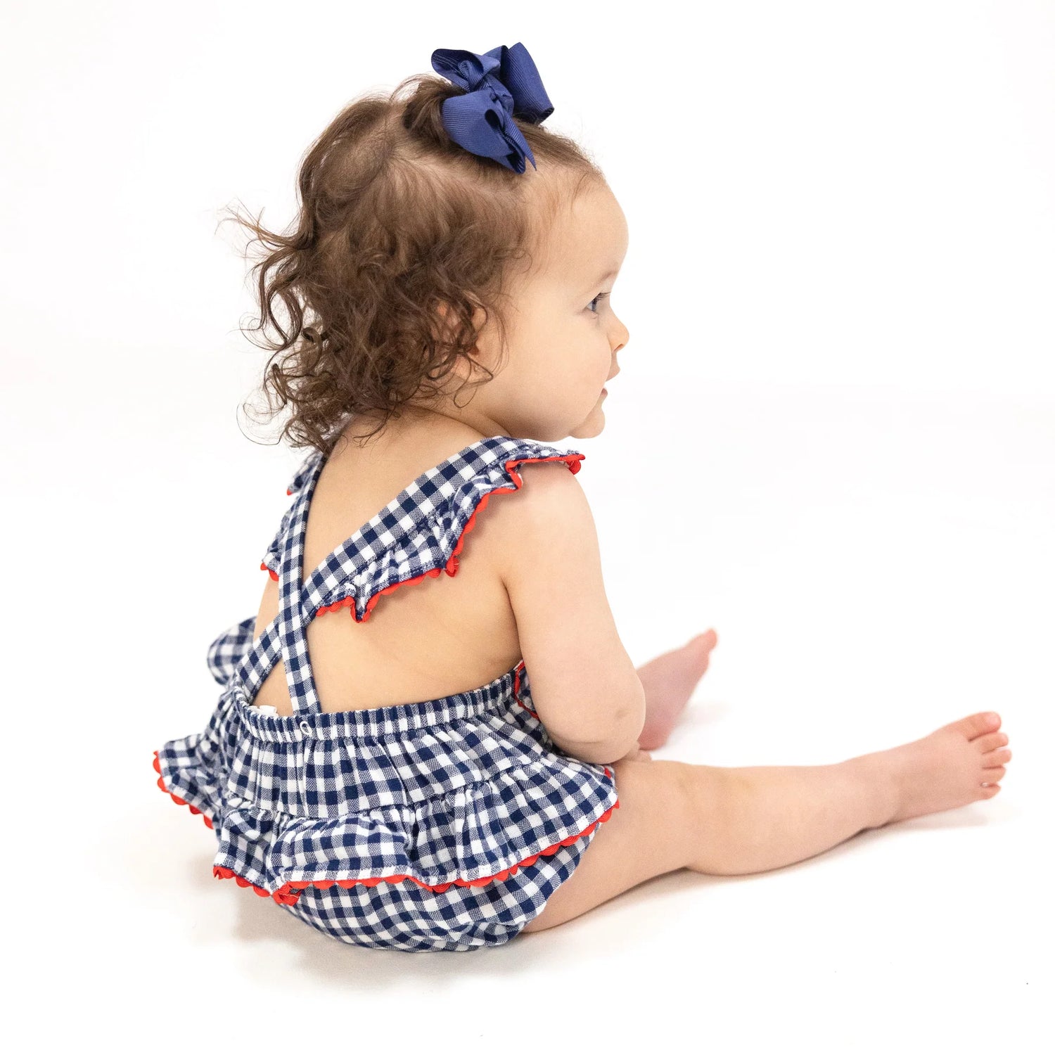 navy gingham sunsuit with red scalloped trim baby girl outfit