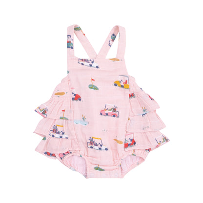 pink ruffle sunsuit with golf design