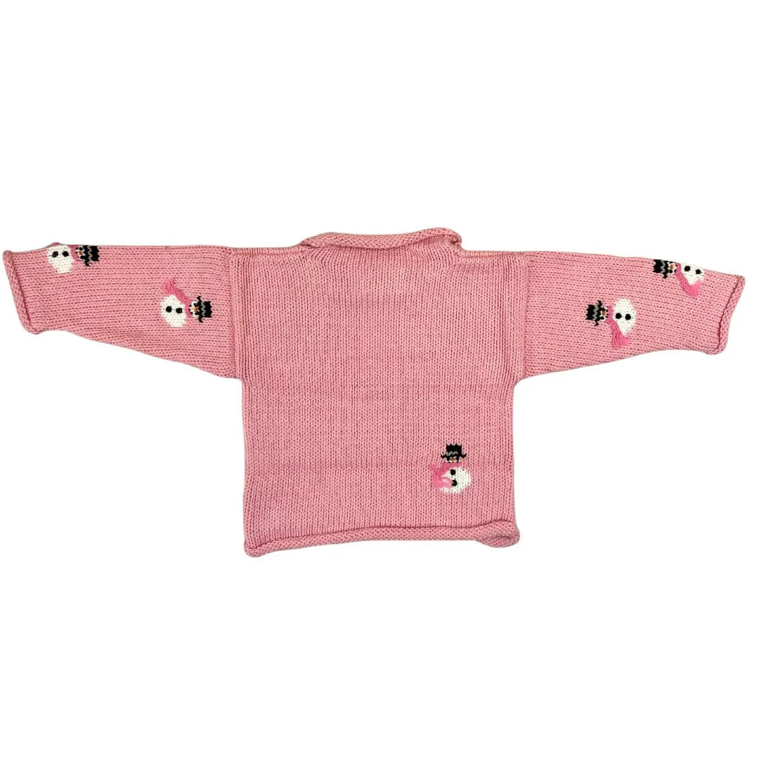 pink sweater with snowmen wearing hats and scarves all over