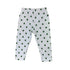 white leggings with green shamrocks all over