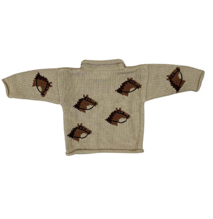 tan sweater with horse heads all over