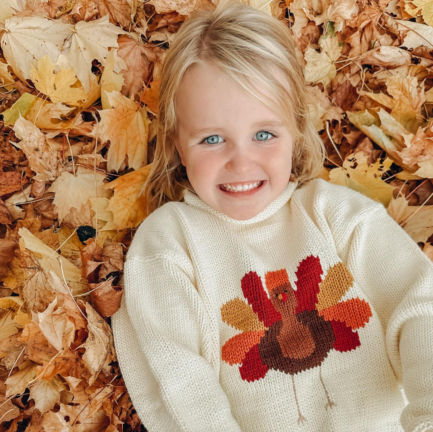 Ivory Turkey Roll Neck Sweater