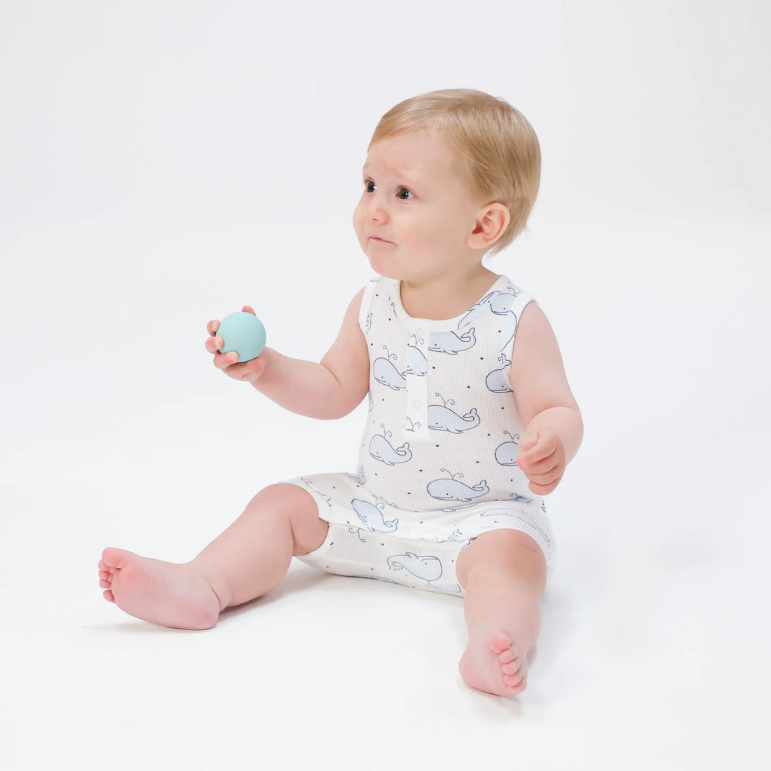 white romper with blue whales all over