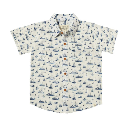 ivory shirt with blue sailboats all over