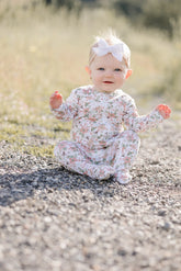 baby wearing footie