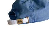 back of hat shows white clasp