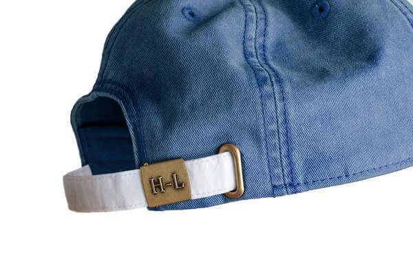back of hat shows white clasp