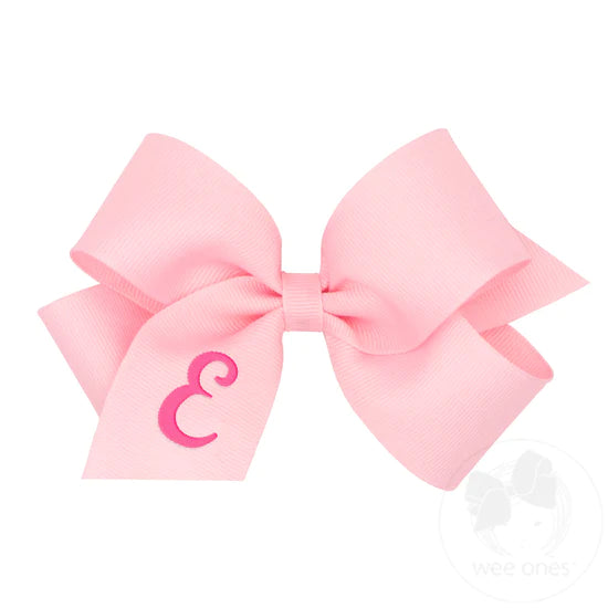 pink bow with letter E