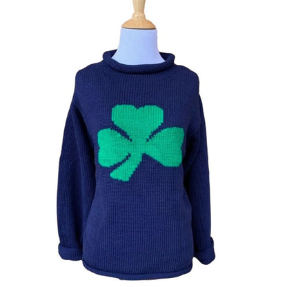 navy long sleeve sweater with green shamrock in center