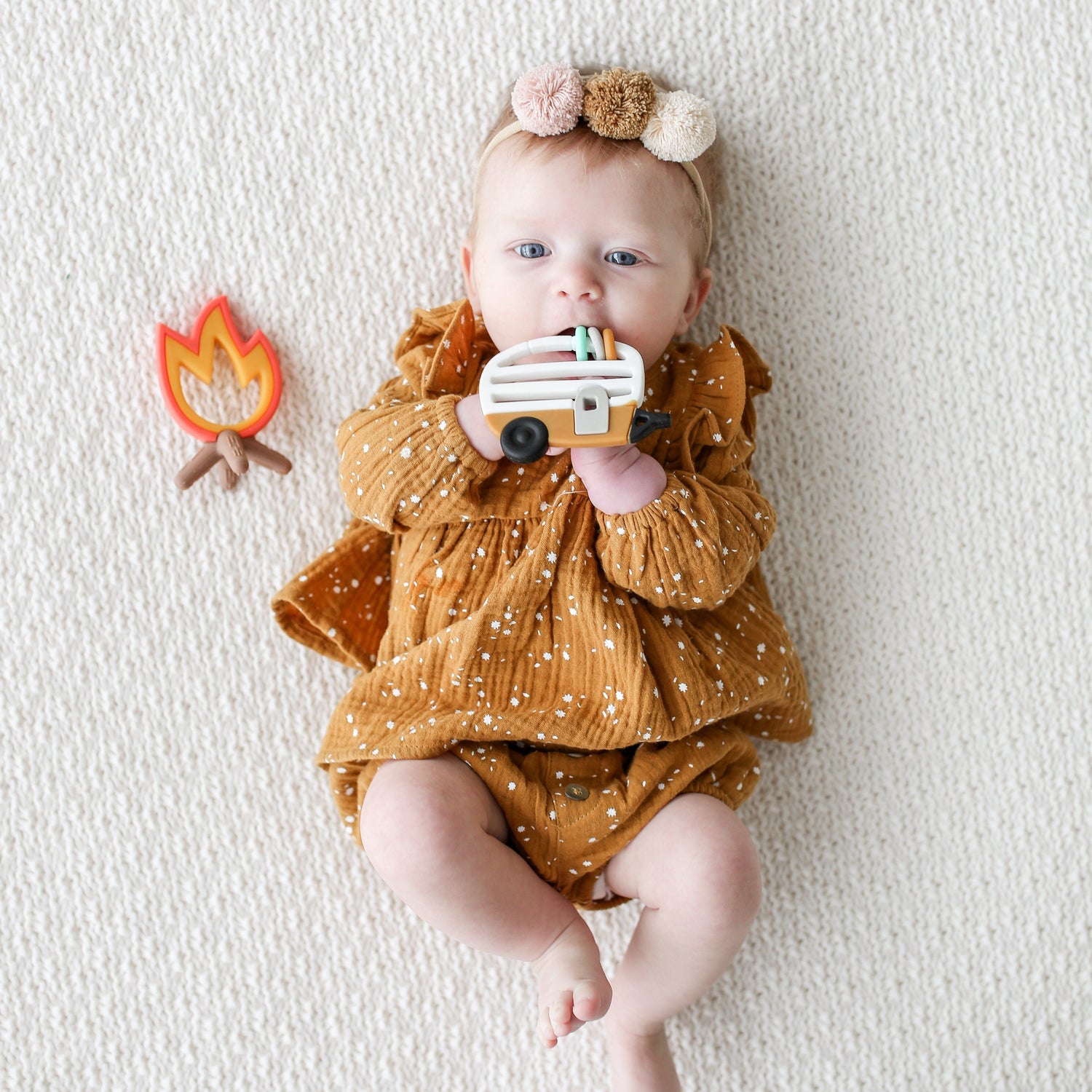 baby girl with teether