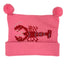 bright pink hat with bottom rolled up once and two poms at top, red horizontal lobster design in center