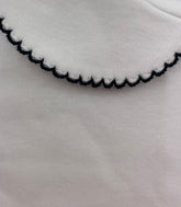 navy scalloped trim on collar